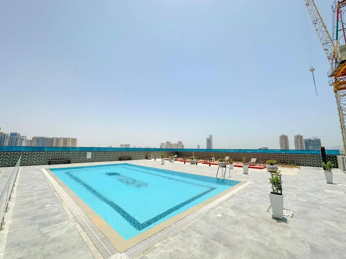 Apartamento Aws Holiday Homes - Cozy Studio In Jvc Dubai